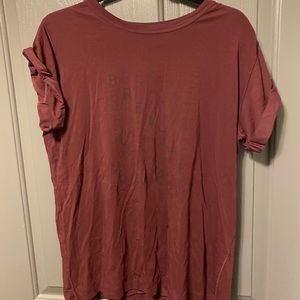 Lululemon t-shirt that says Breathe on it.